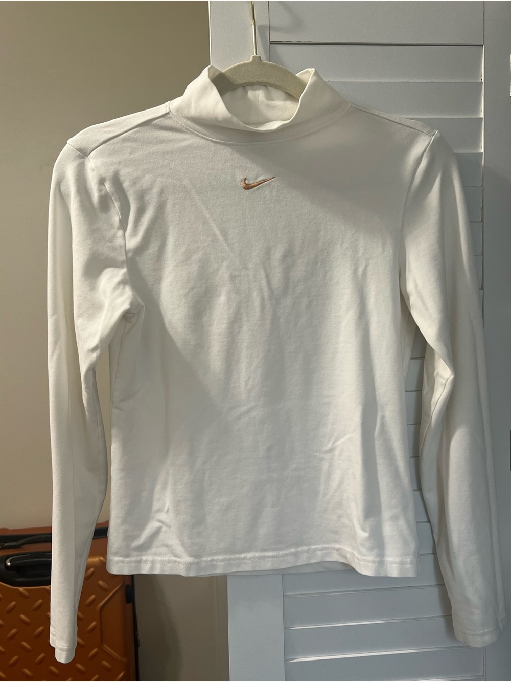 Nike White Long-Sleeve Mock Neck Top with Peach Swoosh